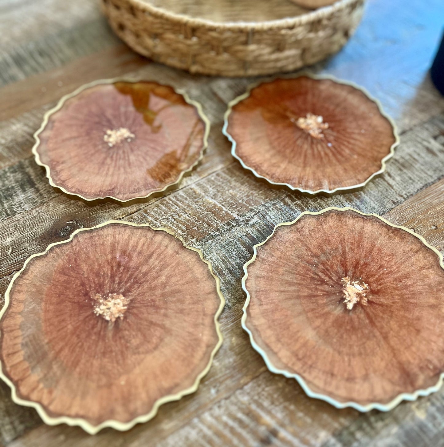Geode Copper Coaster with Gold flakes in the middle as well as a painted gold edge