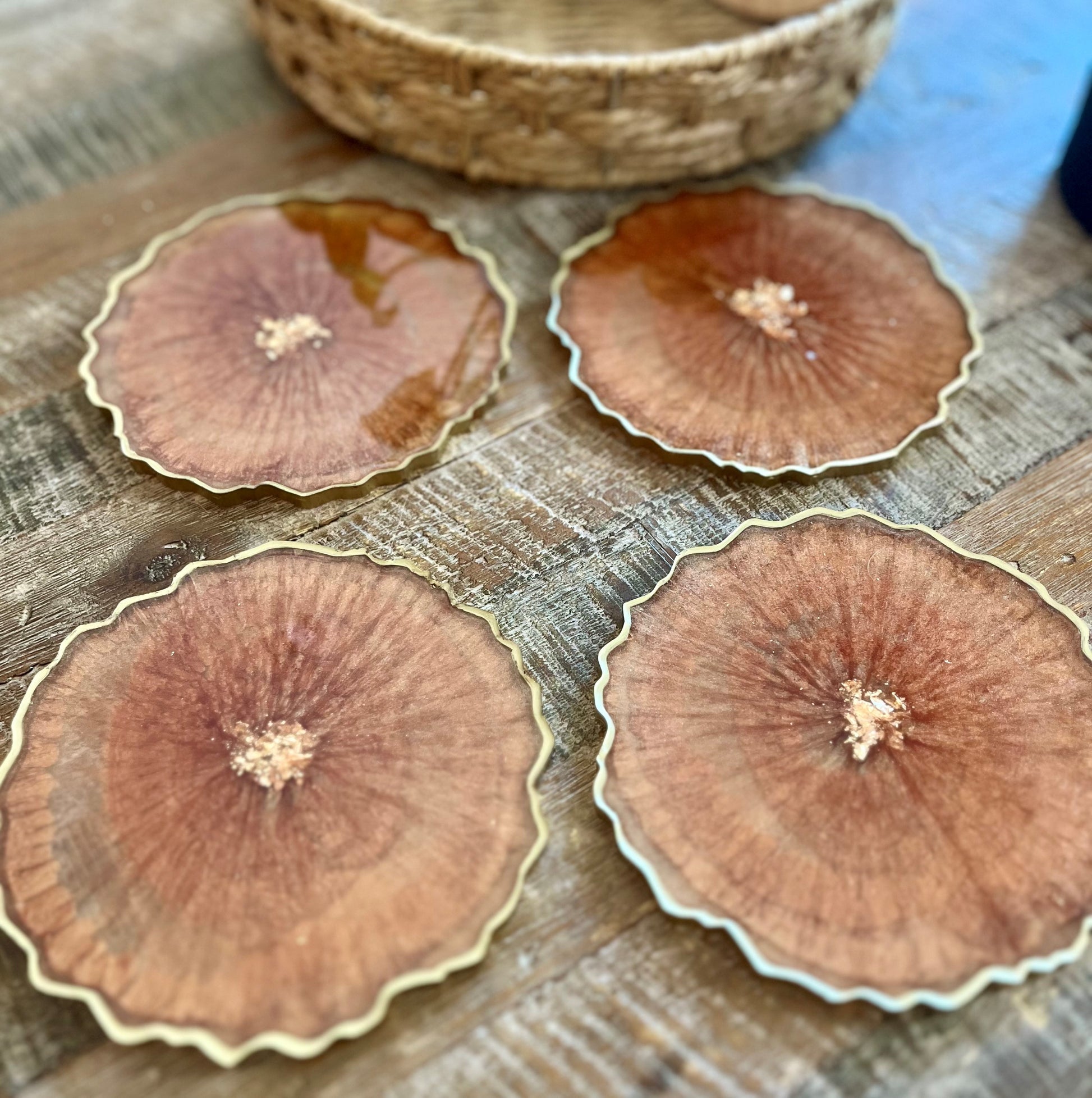 Geode Copper Coaster with Gold flakes in the middle as well as a painted gold edge