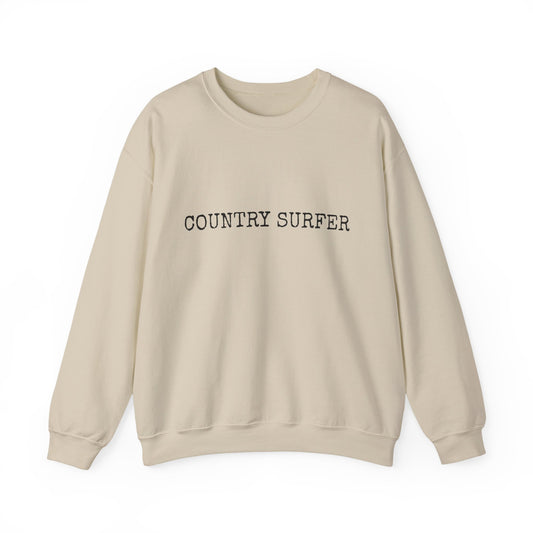 Beige sweatshirt with 'COUNTRY SURFER' text on a white background